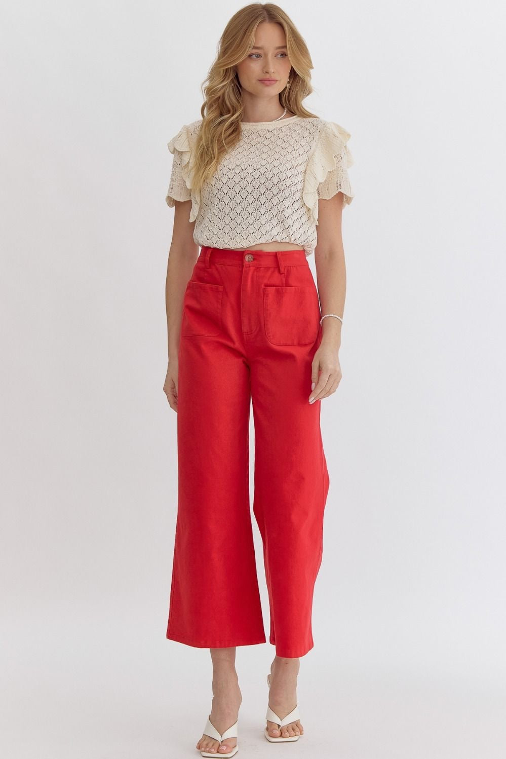 High waisted wide legs pants w/ pockets at front faux pockets at back. Zipper closure at front